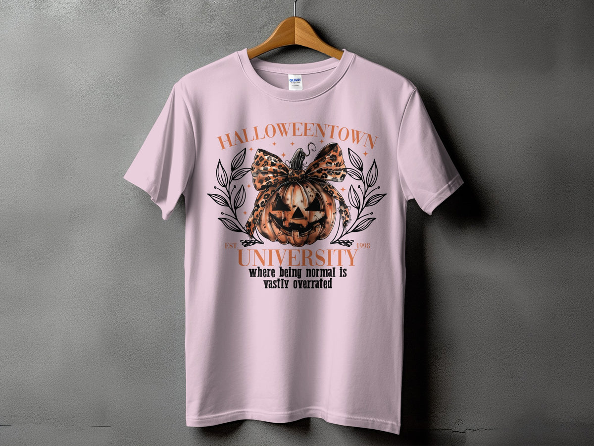 Light pink t-shirt with "Halloweentown University" graphic featuring a jack-o'-lantern and leopard print bow.