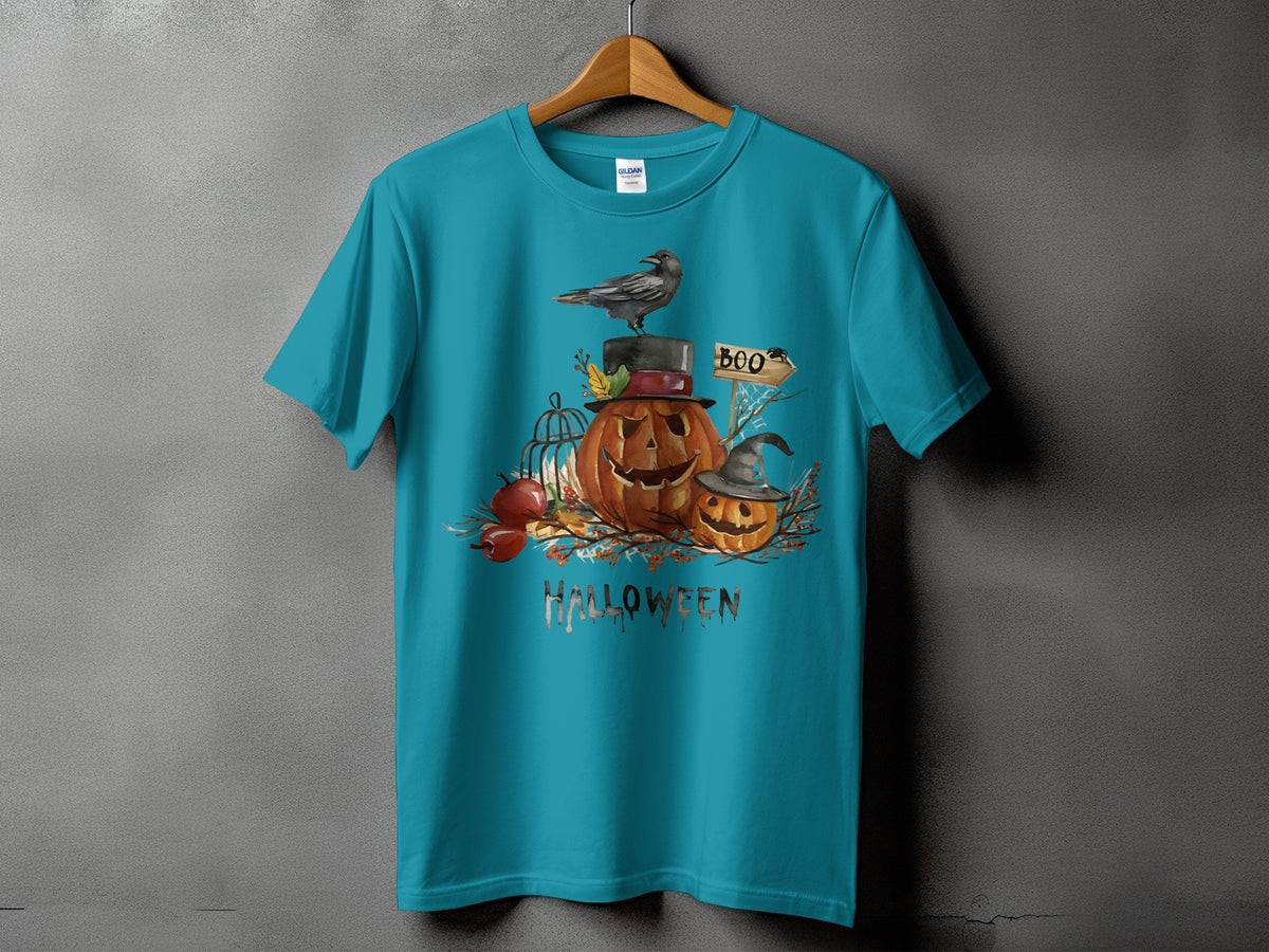 Teal t-shirt with Halloween design featuring pumpkins, crow, and "HALLOWEEN" text.