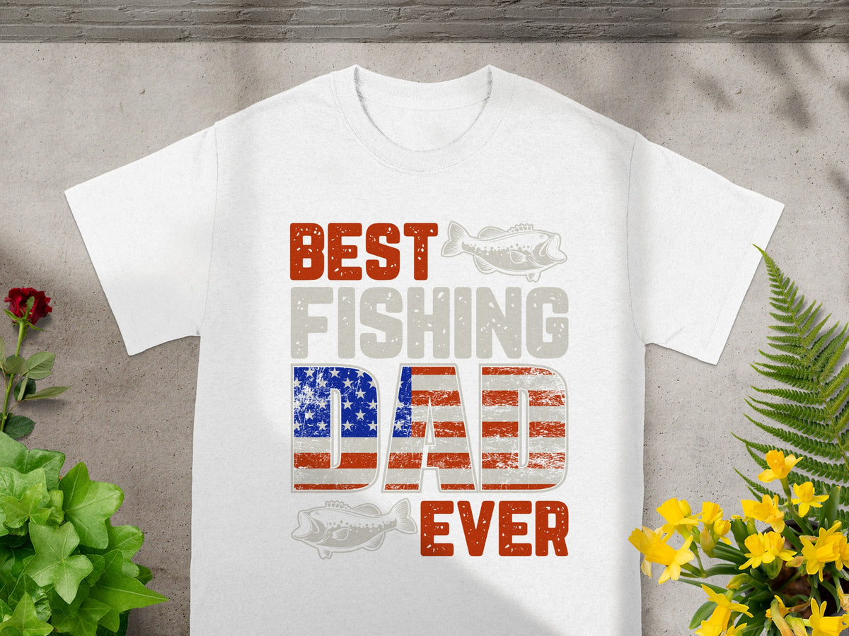 White t-shirt with "BEST FISHING DAD EVER" text featuring American flag detail.