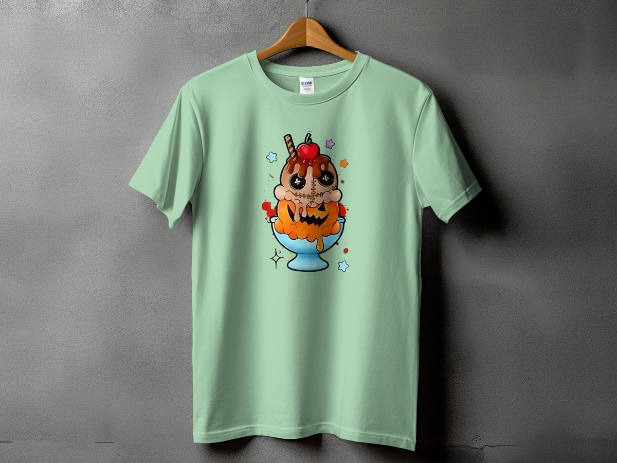 Green t-shirt with a spooky ice cream sundae graphic featuring a pumpkin and stitched details.