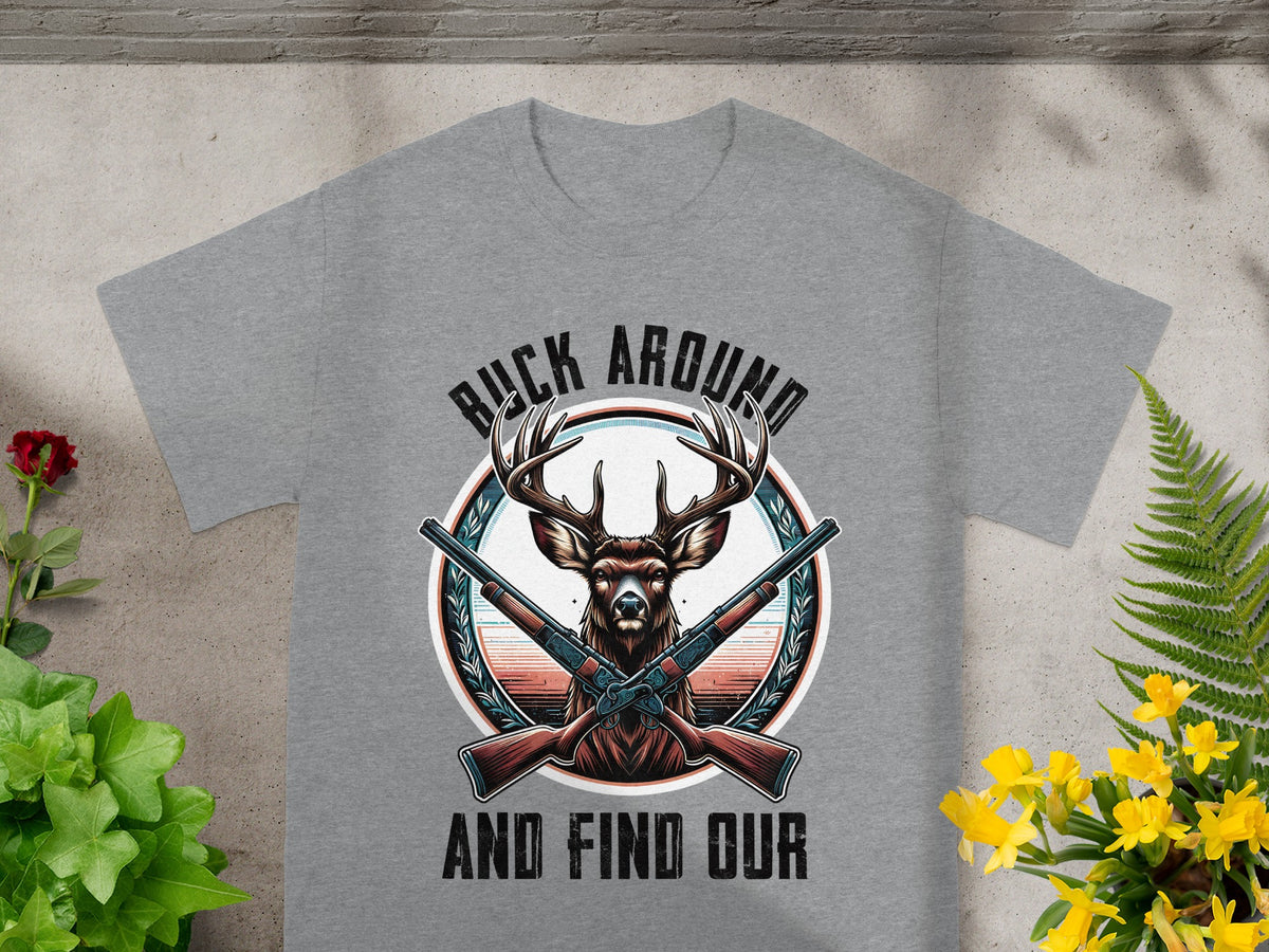 Grey t-shirt with a buck and crossed rifles graphic, text reads "Buck Around And Find Our".