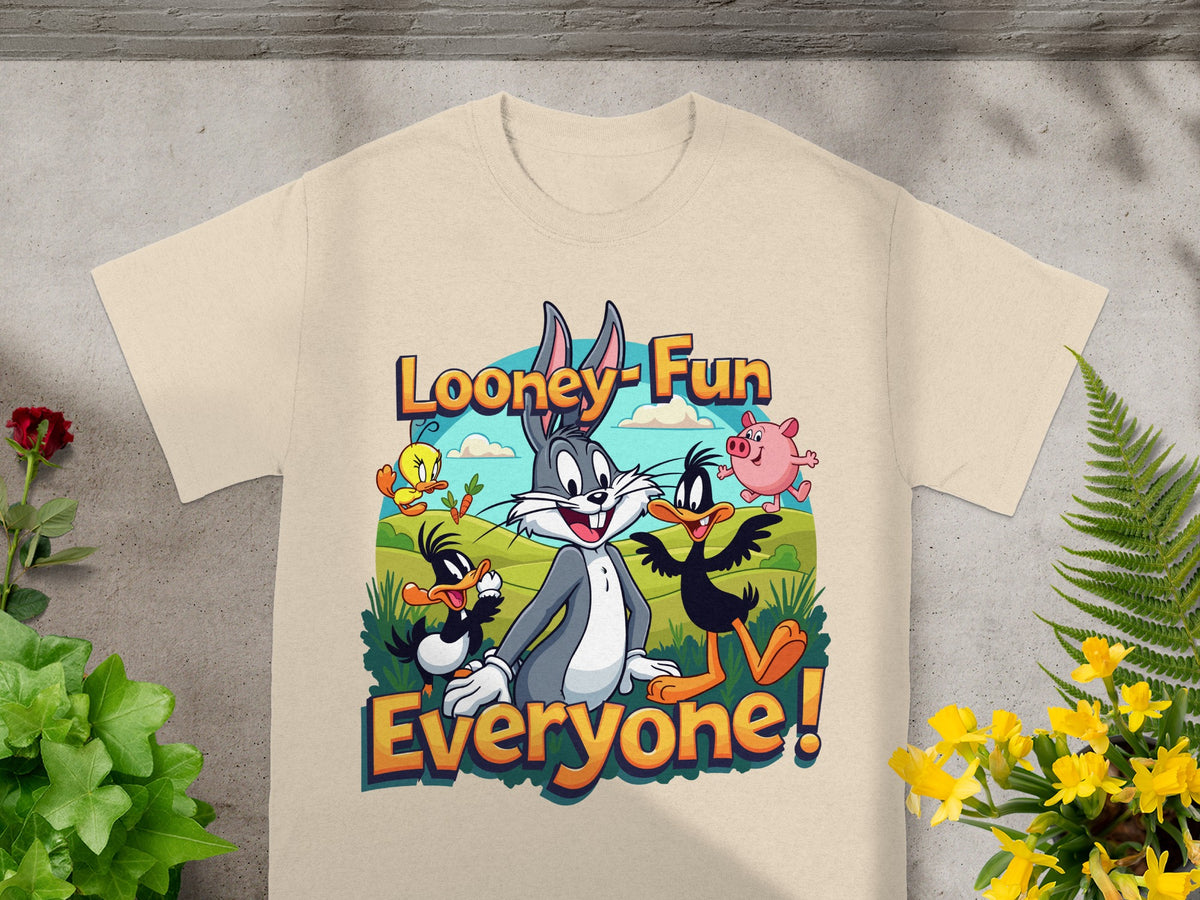 Looney Tunes characters Bugs Bunny, Daffy Duck, and Porky Pig on a tan t-shirt.