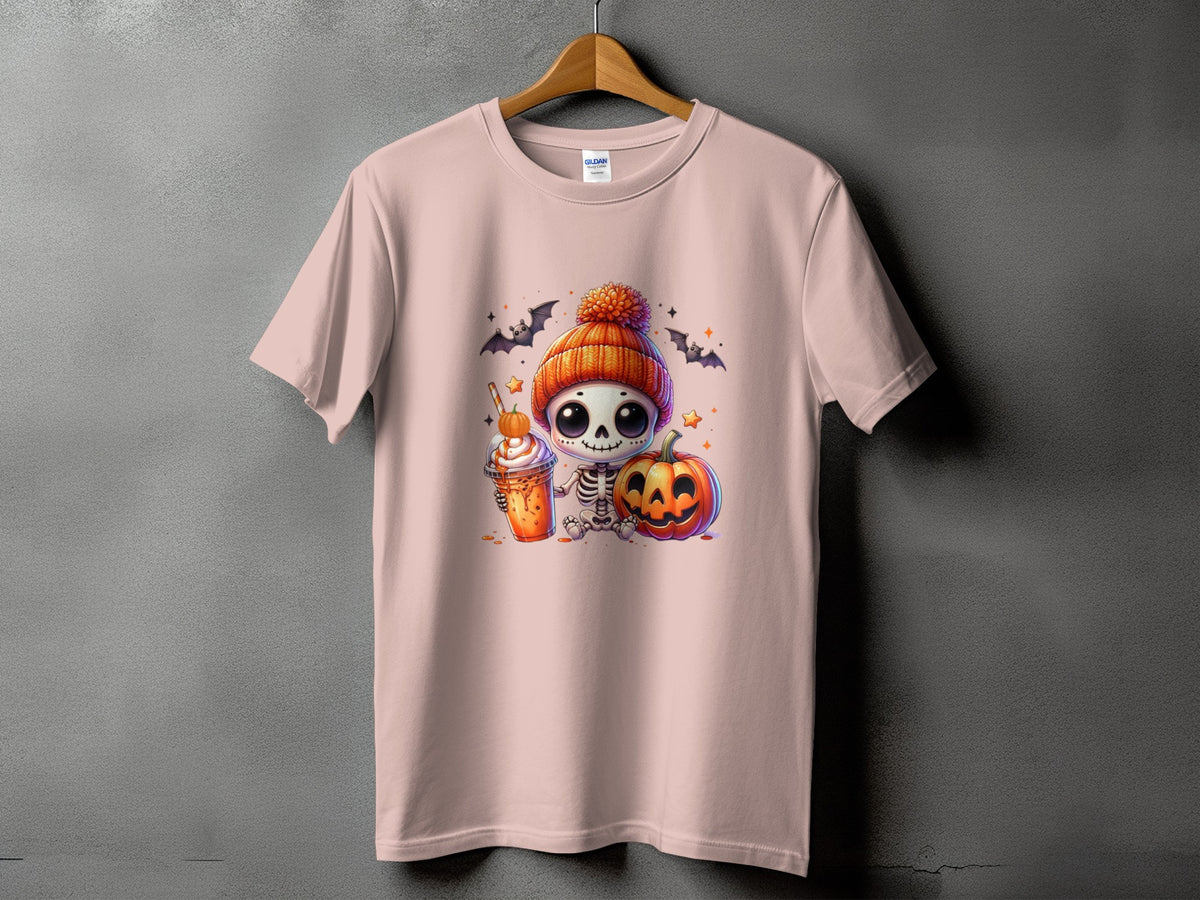 Pink t-shirt with a cute skeleton, pumpkin, and drink graphic.