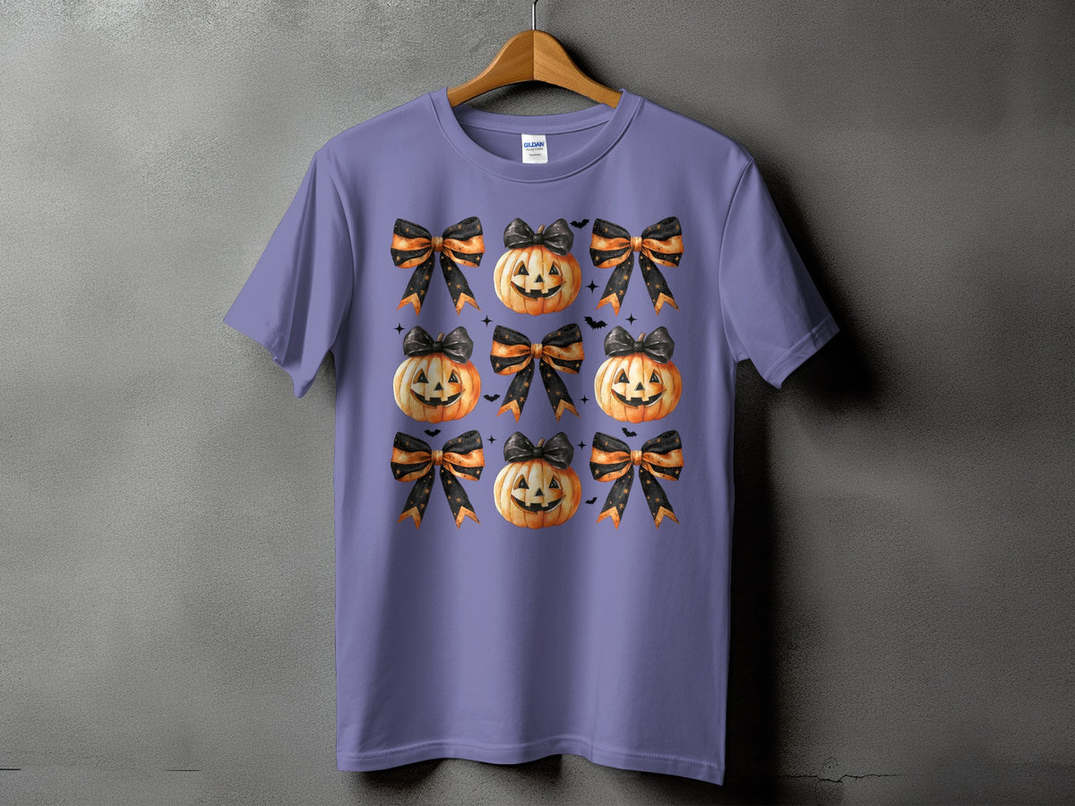 Purple t-shirt with a repeating pattern of jack-o'-lanterns and Halloween bows.