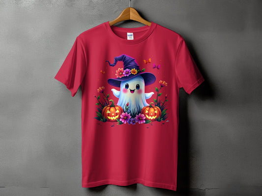 Red t-shirt with a happy ghost wearing a witch hat and surrounded by pumpkins and flowers.