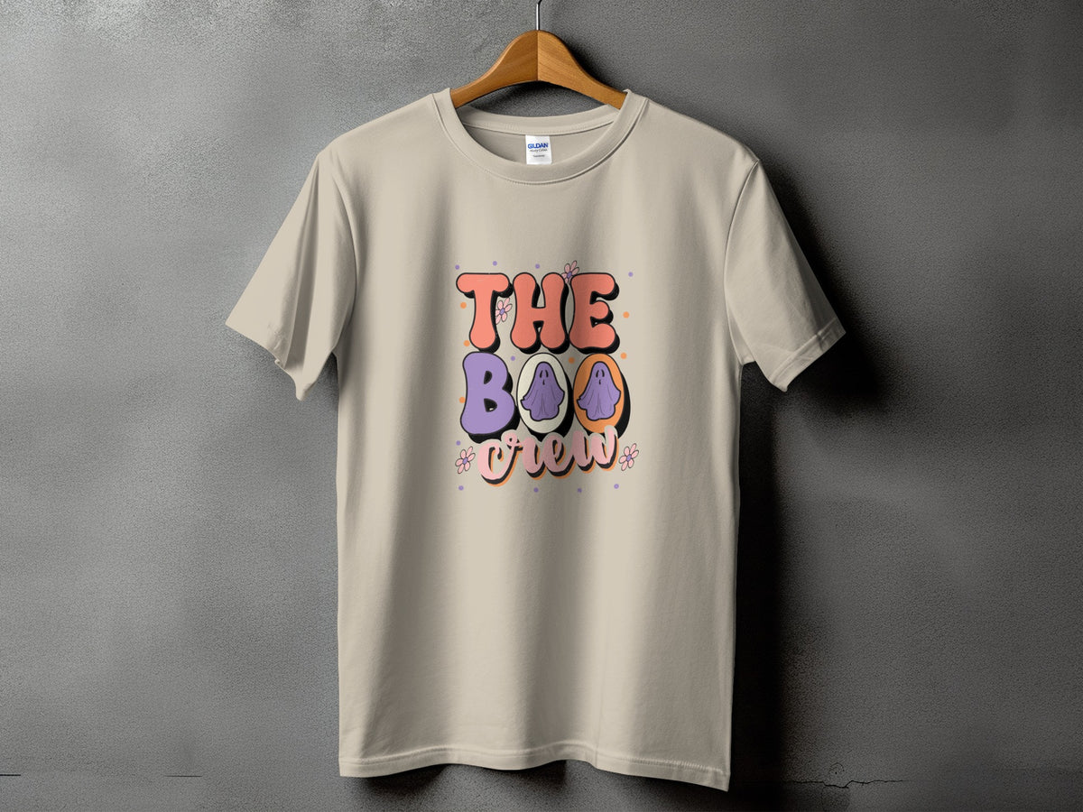 Light tan t-shirt with "The Boo Crew" text and ghost graphic.