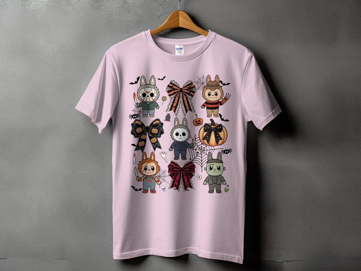 Pink t-shirt with a collage of cute Halloween-themed characters and bows.