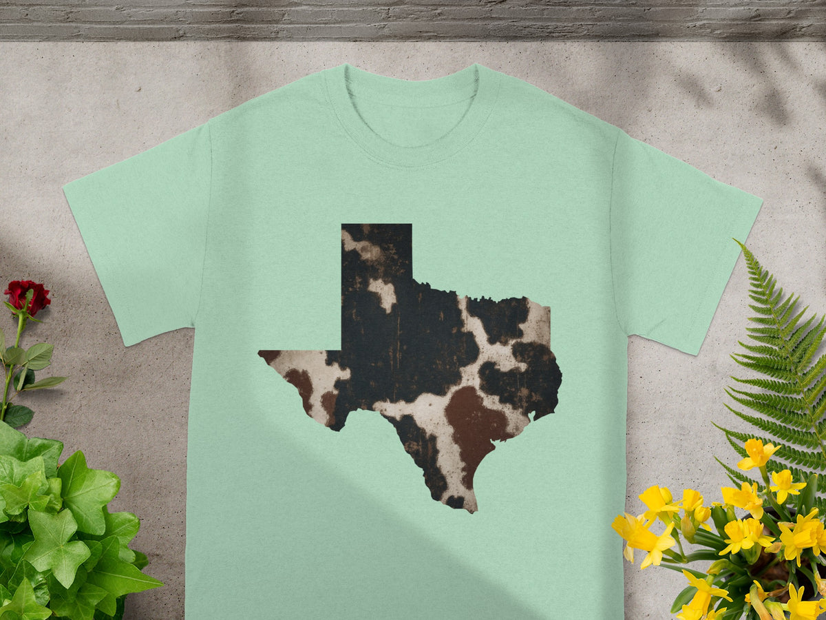 Mint t-shirt with a cowhide pattern Texas outline graphic.