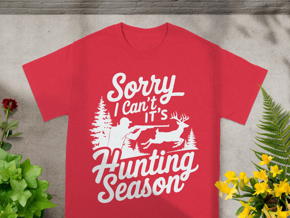 Red t-shirt with white text and hunting graphic.