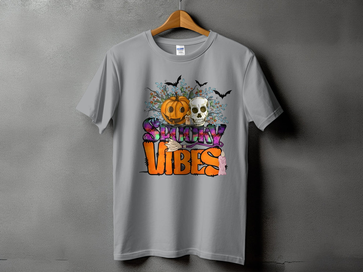 Gray t-shirt with "Spooky Vibes" graphic featuring a pumpkin, skull, bats, and candle.