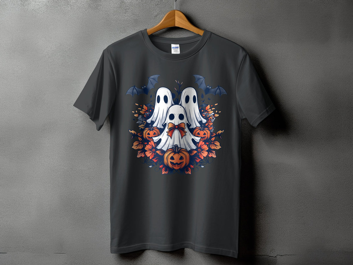 Three ghosts, bats, pumpkins, and orange flowers on a dark t-shirt.
