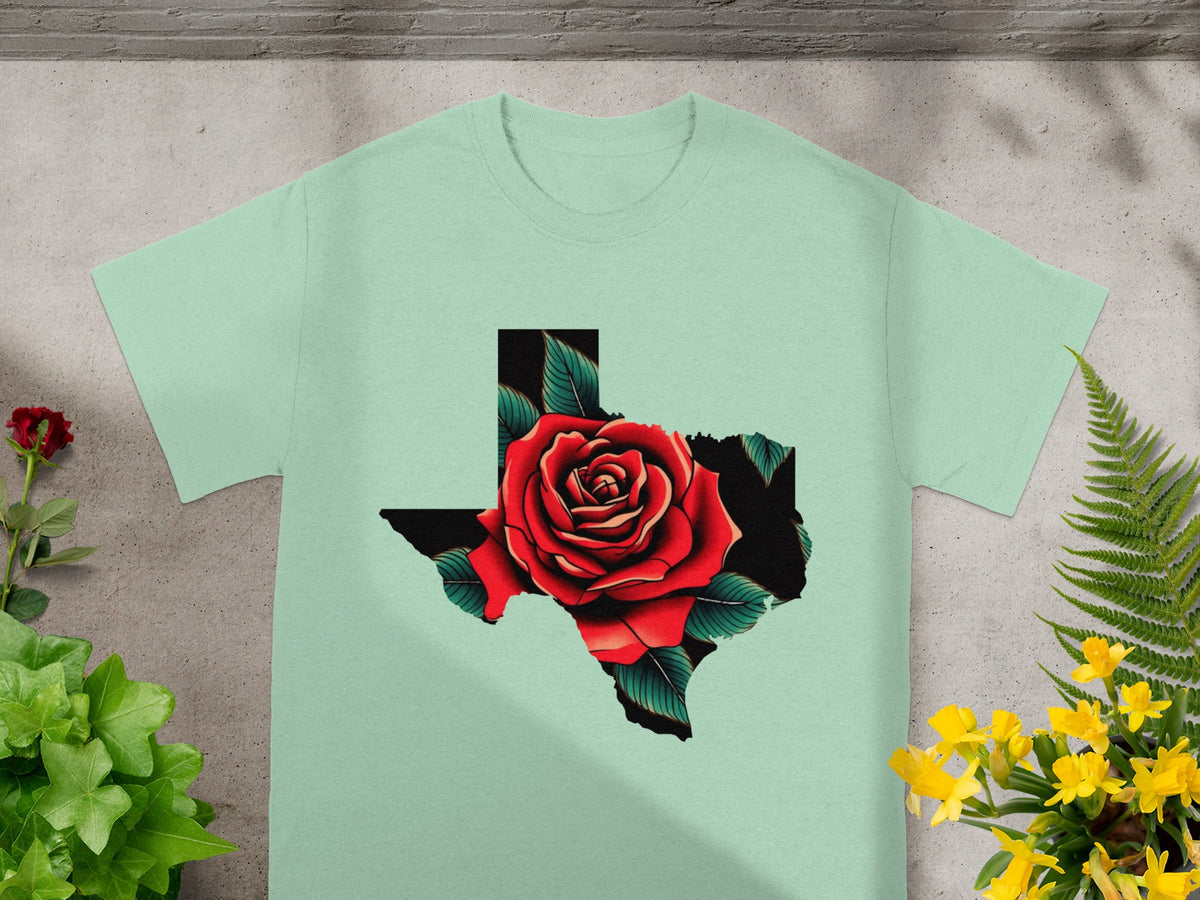 Light green t-shirt with a Texas outline filled with a red rose and green leaves.