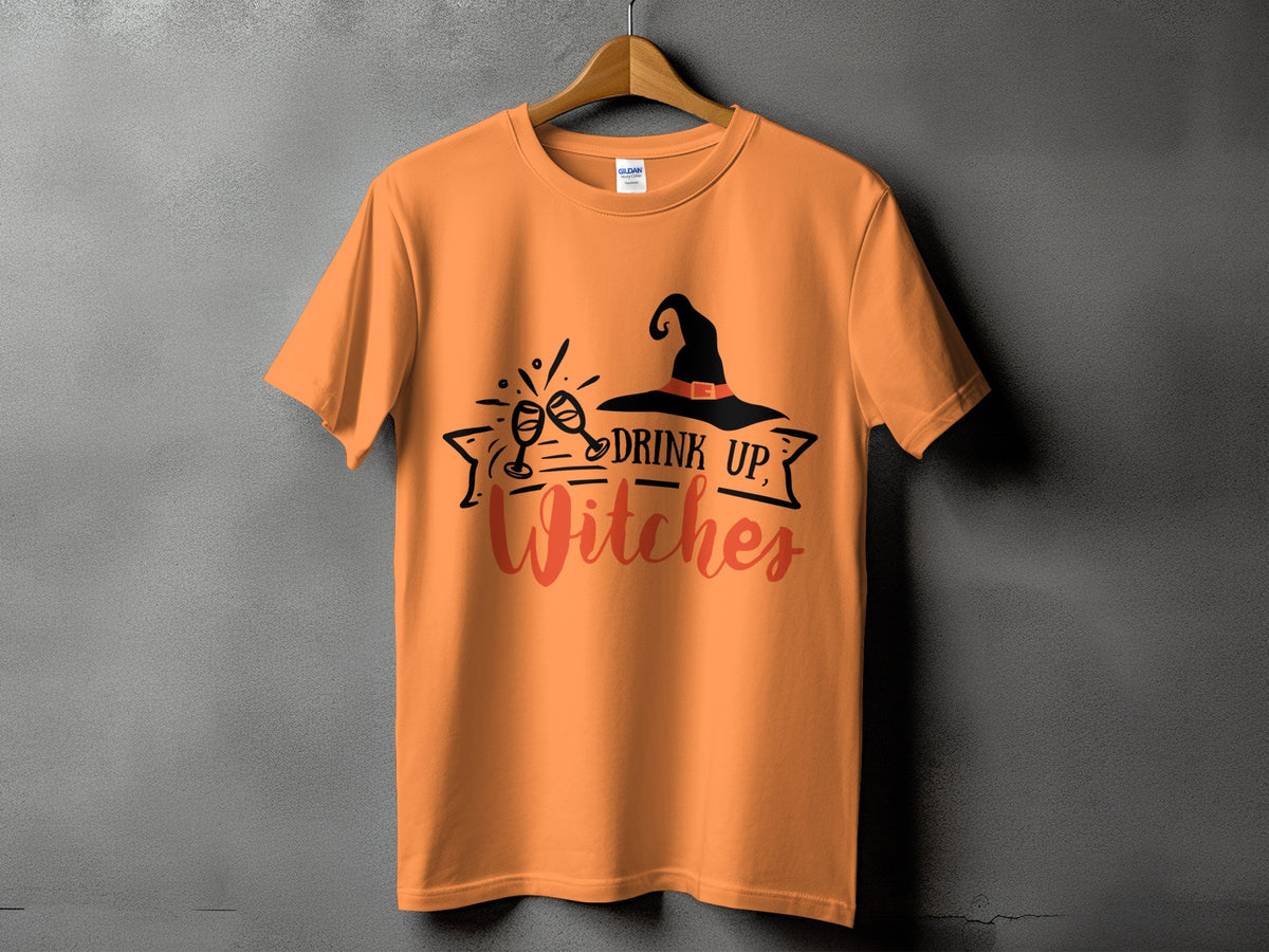 Orange t-shirt with "Drink Up Witches" text and witch hat graphic.