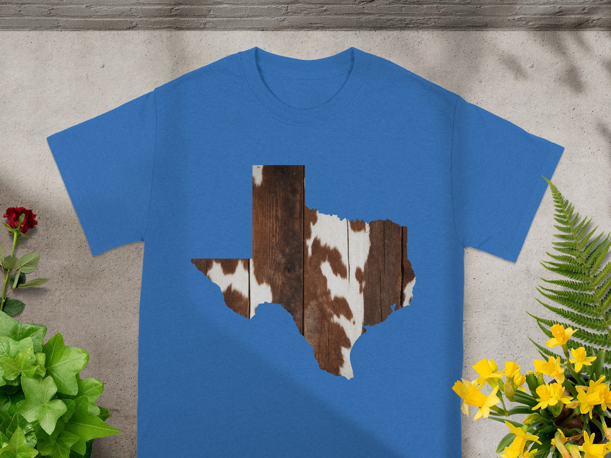Blue t-shirt with Texas map cutout filled with wood and cowhide texture.