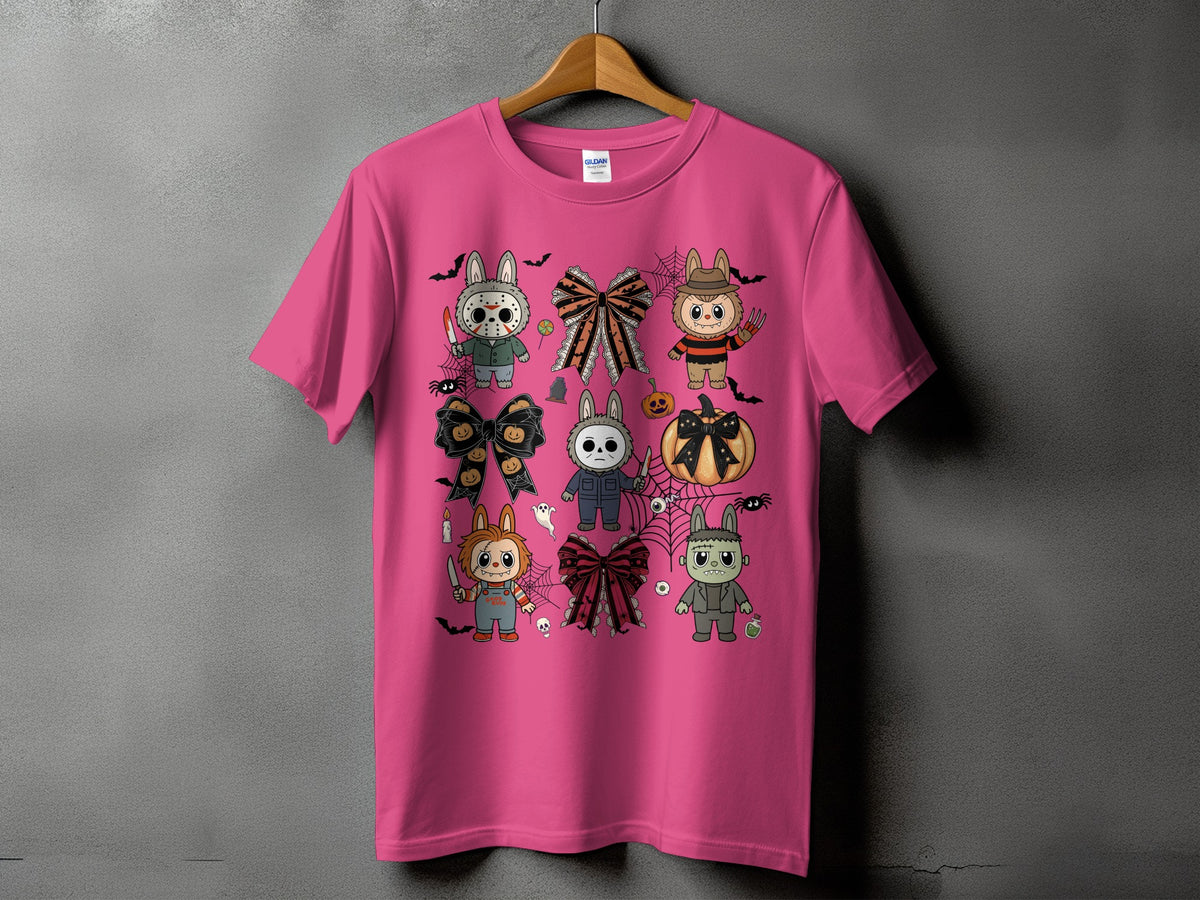 Pink t-shirt with cartoon Halloween characters and bows, including Chucky, Michael Myers, Frankenstein, and Freddy Krueger.