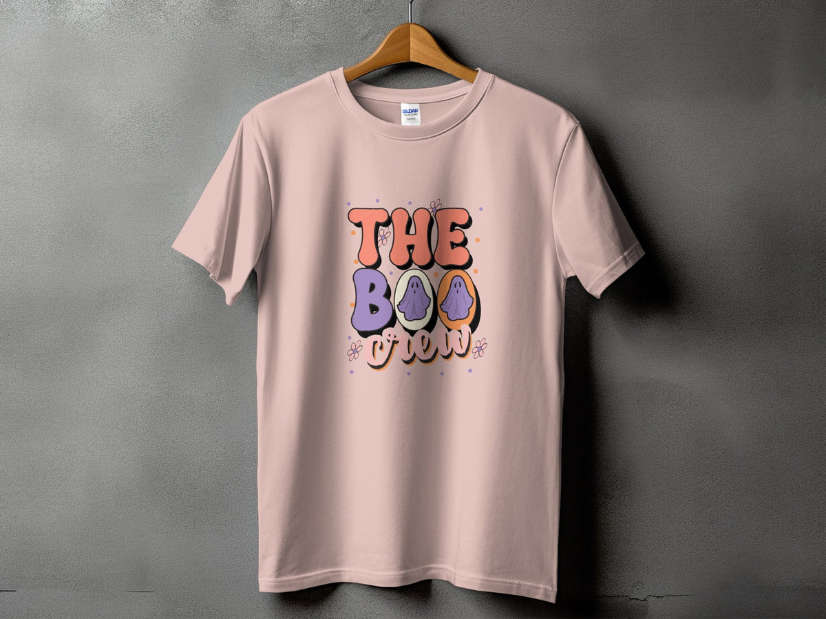 Pink t-shirt with "The Boo Crew" Halloween graphic featuring ghosts.