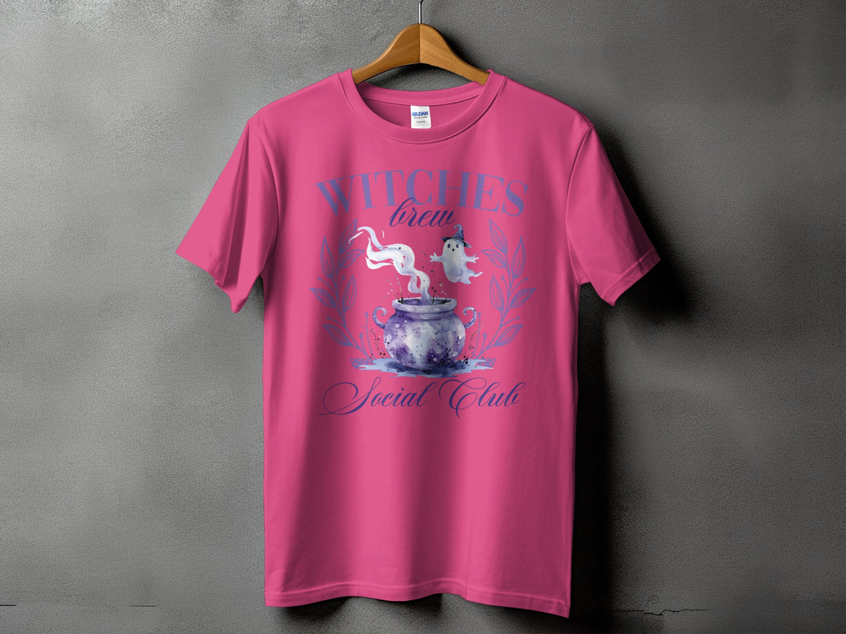 Pink t-shirt with "Witches Brew Social Club" text and cauldron graphic.