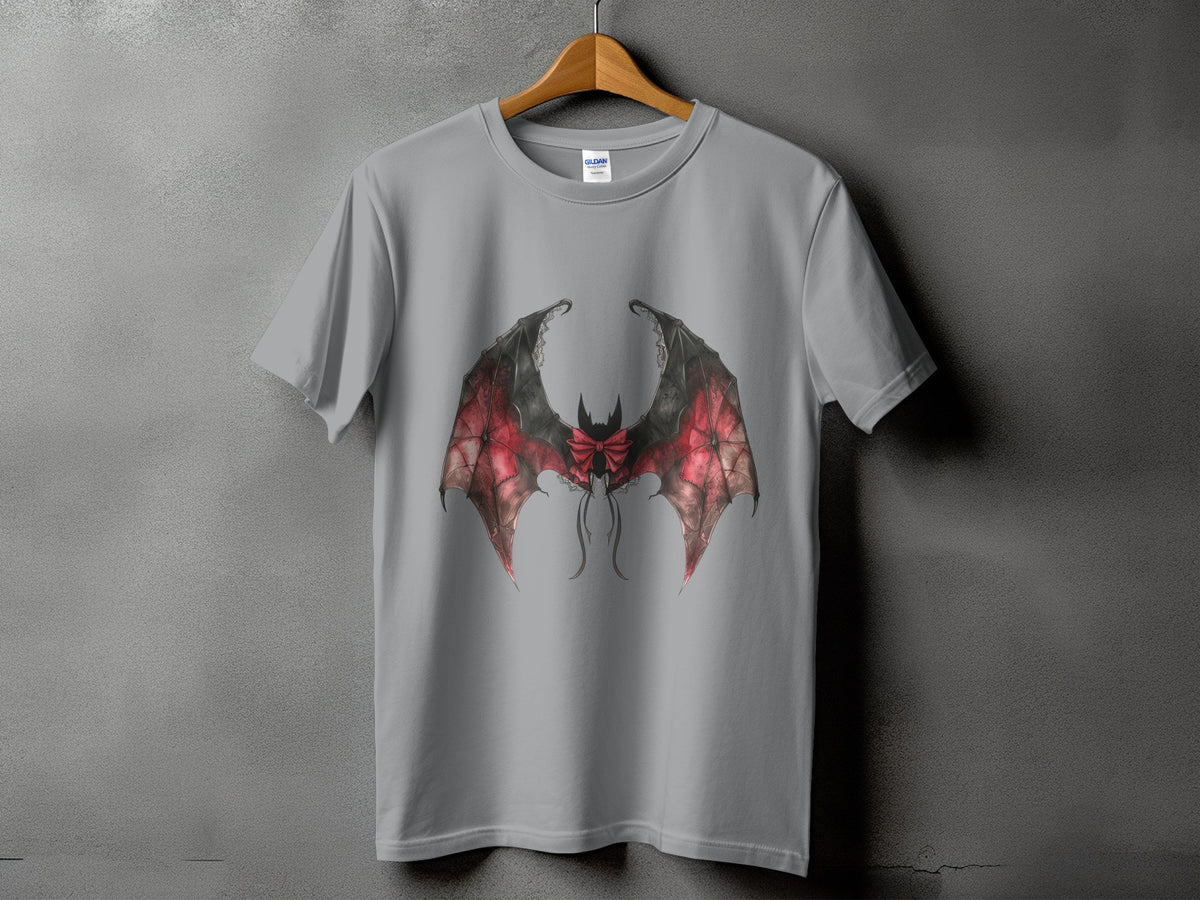 Grey t-shirt with a red and black bat wings graphic with a bow.