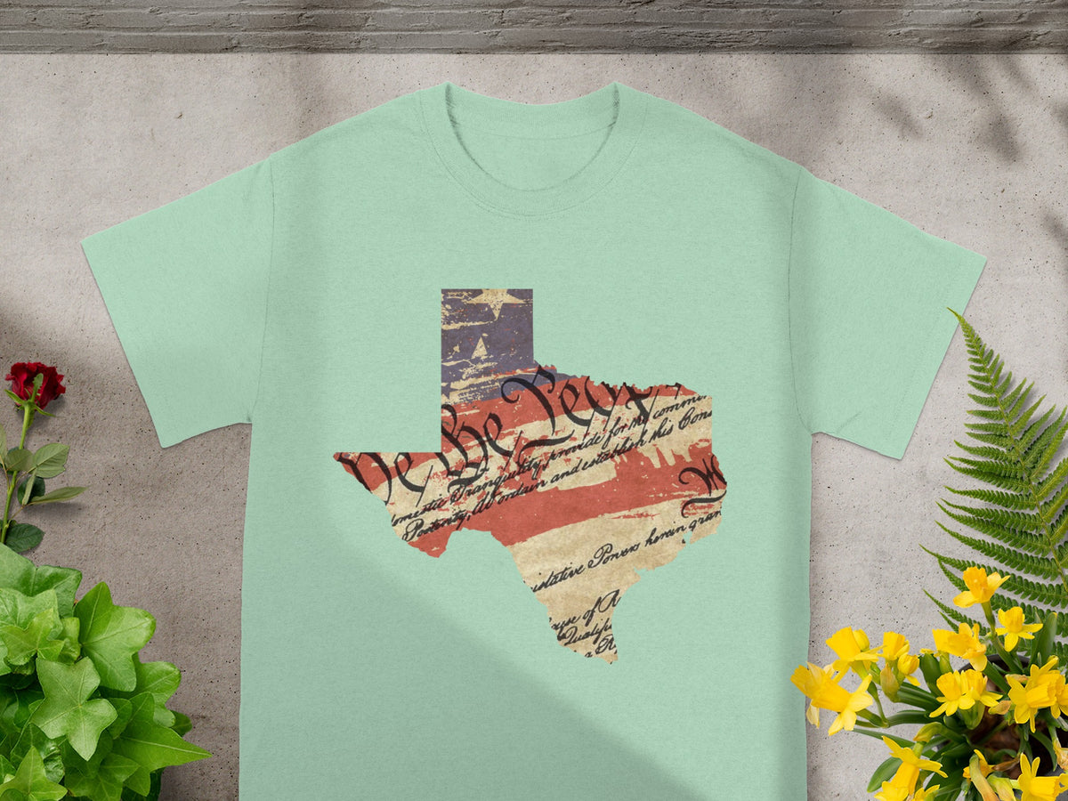 Texas state outline on pale green shirt with distressed US flag and Constitution text.