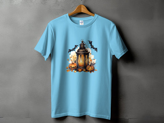 Light blue t-shirt with Halloween graphic of lantern, pumpkins, and bats.