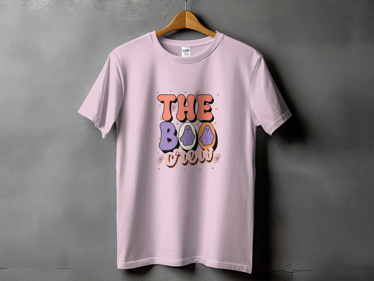 Pink t-shirt with "The Boo Crew" text and ghost graphics.
