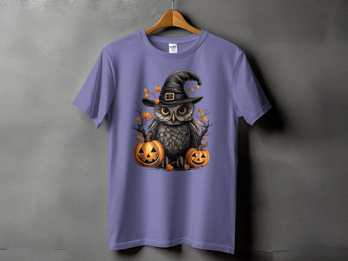 Purple t-shirt featuring a Halloween owl graphic with pumpkins and autumn leaves.