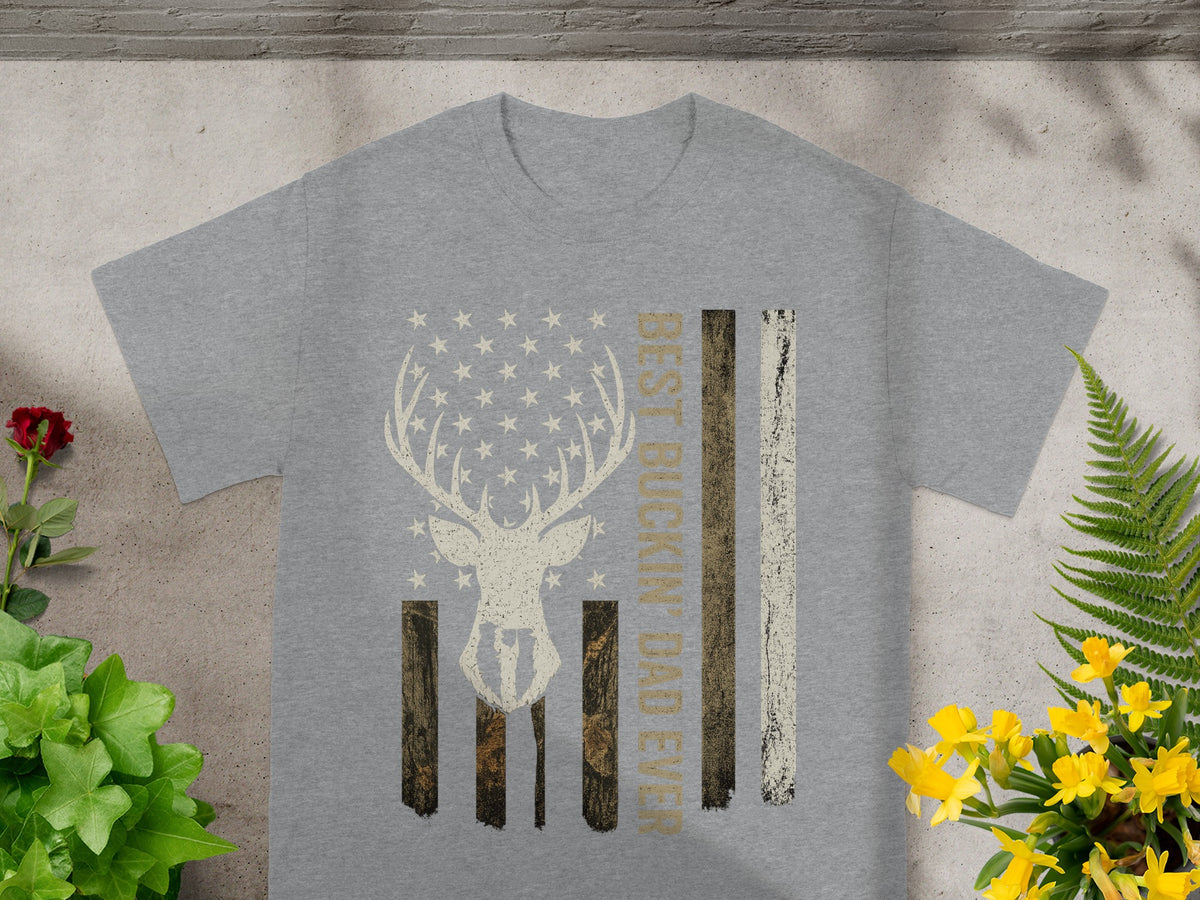 Gray t-shirt with deer silhouette and American flag design reading "BEST BUCKIN' DAD EVER".