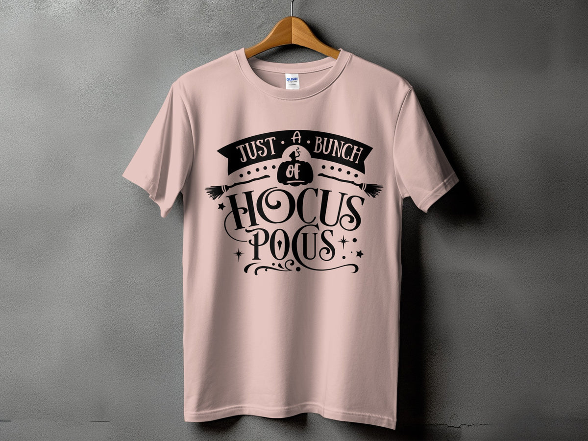 Pink t-shirt with black text reading "Just a bunch of Hocus Pocus" and Halloween graphics.