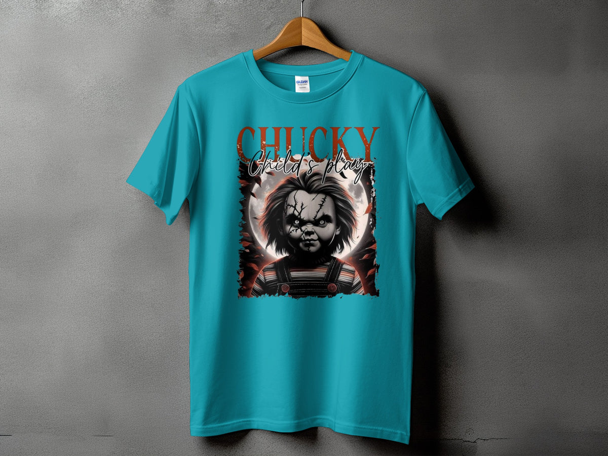 Chucky doll graphic with "Child's Play" text on a teal t-shirt.