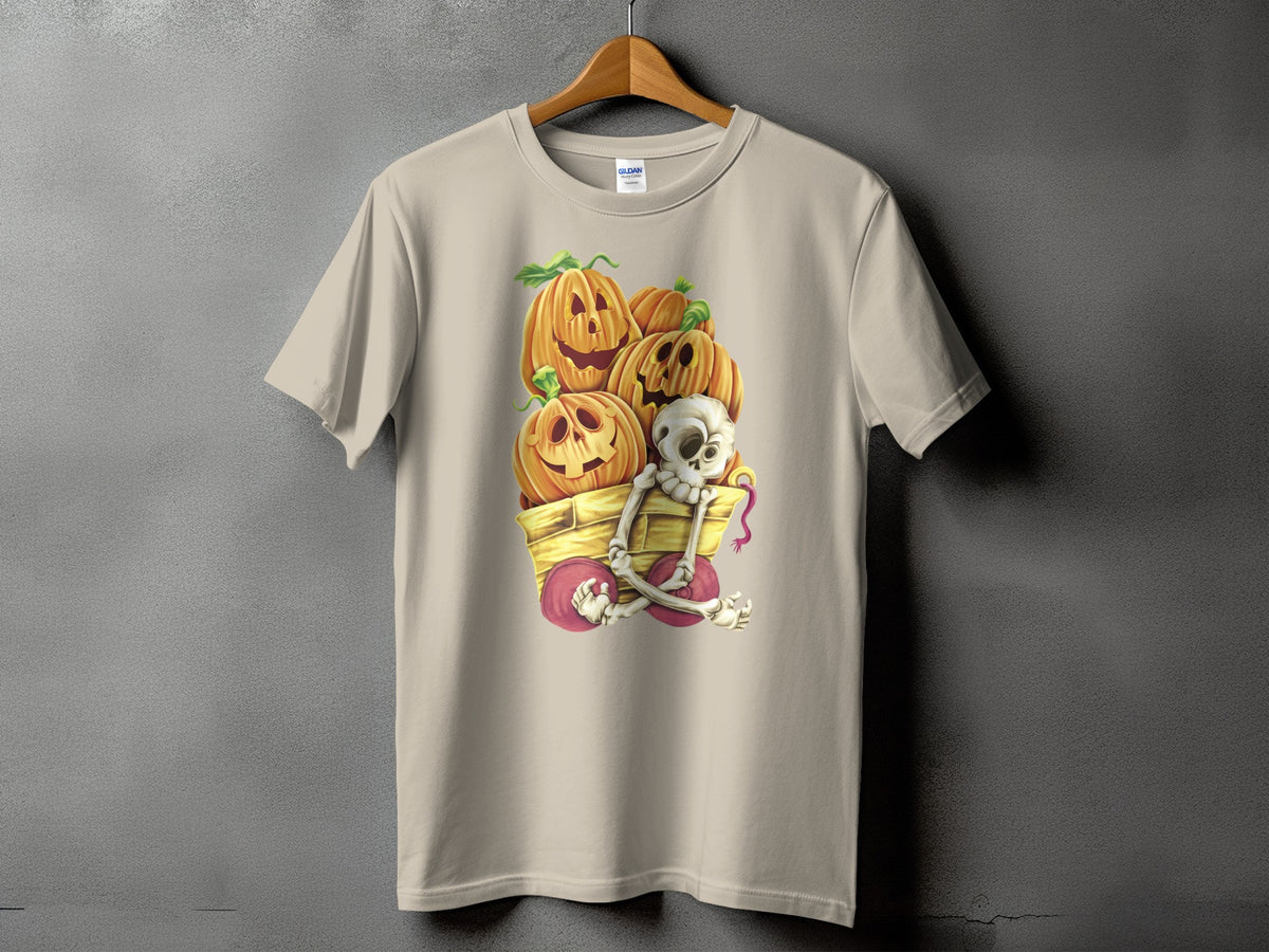 T-shirt with a cart full of jack-o'-lanterns and a skeleton.