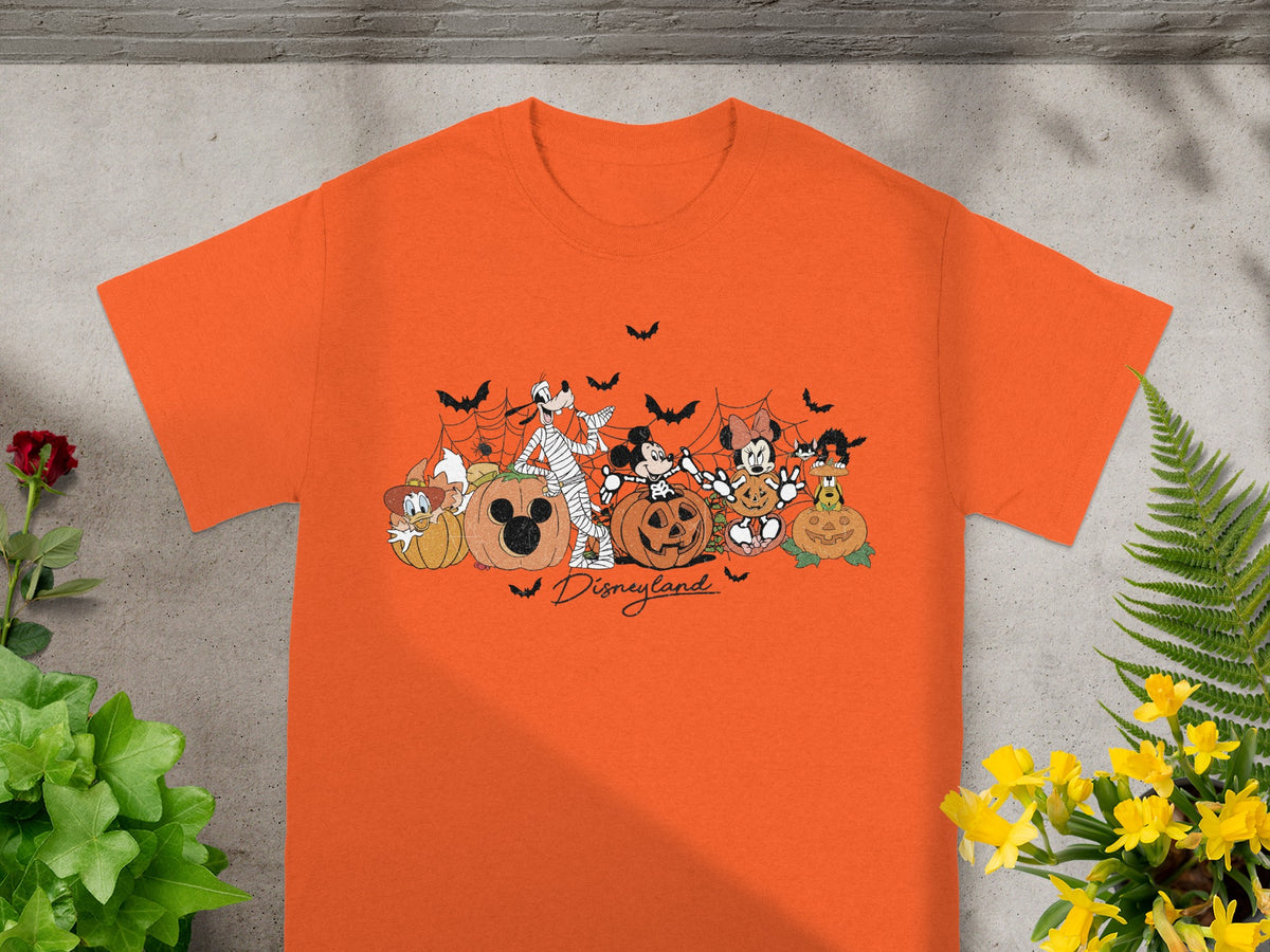 Orange t-shirt with Disneyland Halloween graphic of characters and pumpkins.