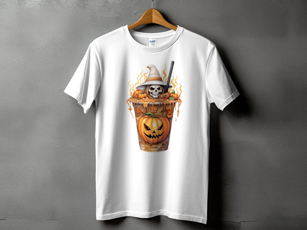 White t-shirt with a Halloween design of a skull in a witch hat, pumpkins, and caramel.