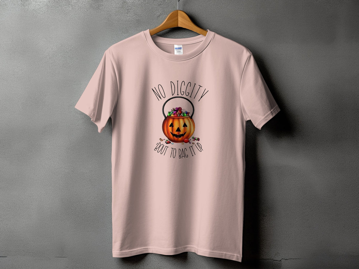 Light pink t-shirt with a jack-o'-lantern candy bucket and the text "NO DIGGITY 'BOUT TO BAG IT UP."