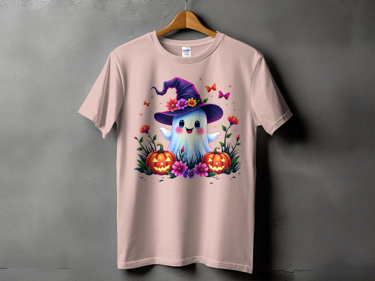 Pink t-shirt with a cute ghost wearing a witch hat, pumpkins, and flowers.