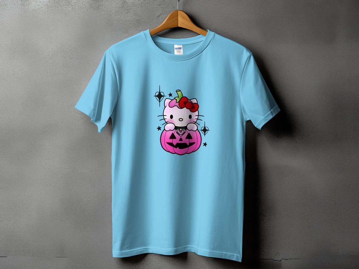 Light blue t-shirt with a pink Hello Kitty sitting in a pink pumpkin.