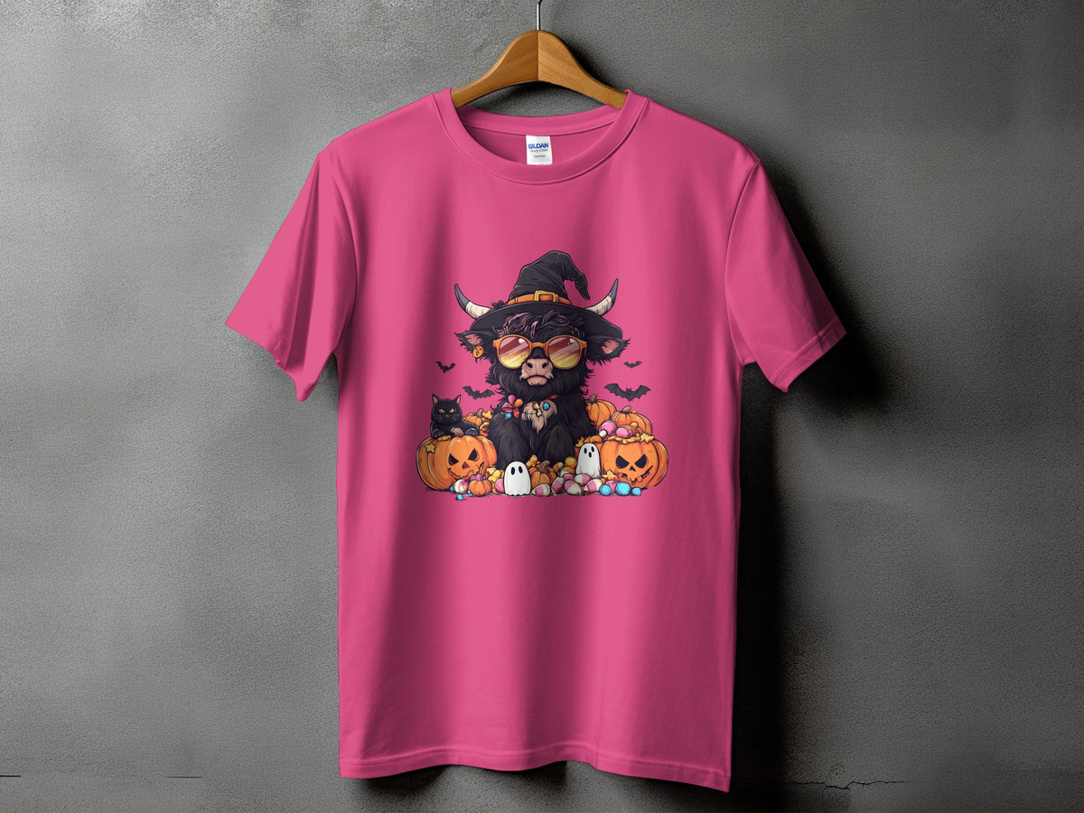 Halloween Highland cow with pumpkins, black cat, and ghosts on a pink t-shirt.