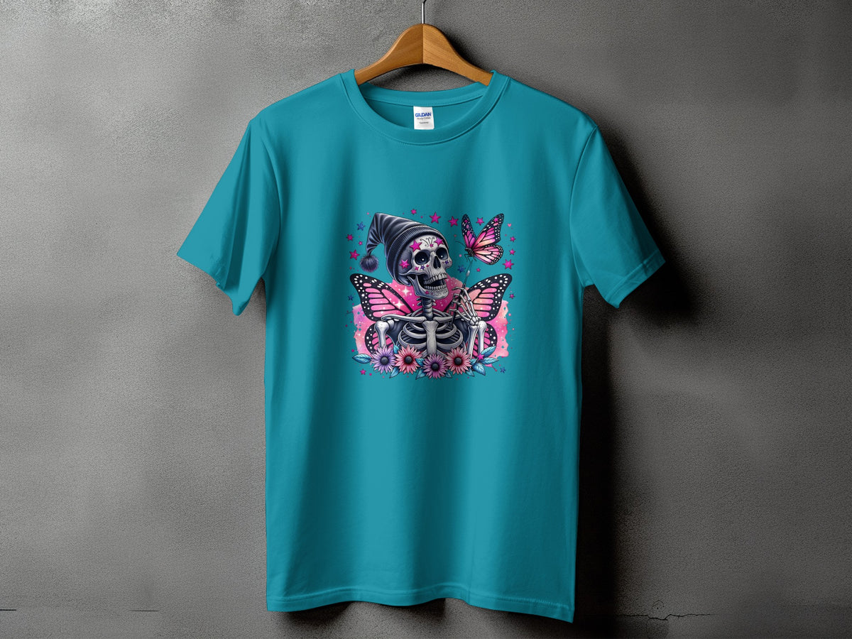 Teal t-shirt with a skeleton wearing a hat, surrounded by butterflies and flowers.