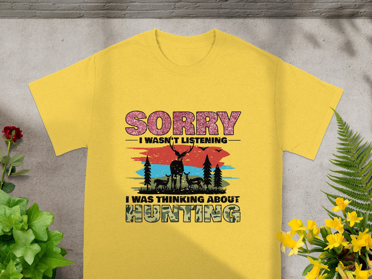 Yellow t-shirt with "SORRY I WASN'T LISTENING" and deer graphic.
