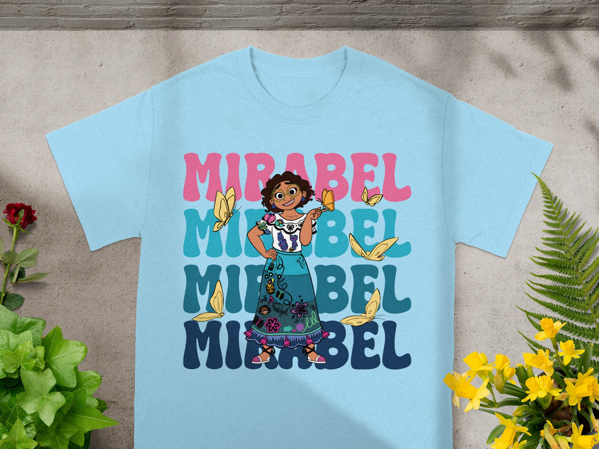Light blue t-shirt with "Mirabel" in colorful text and butterflies.
