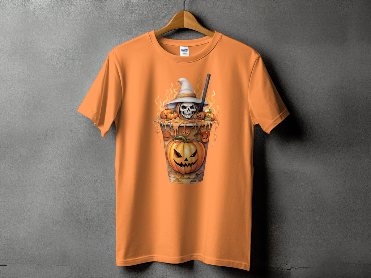 Orange t-shirt with a Halloween-themed graphic of a skull wearing a witch hat and pumpkins.