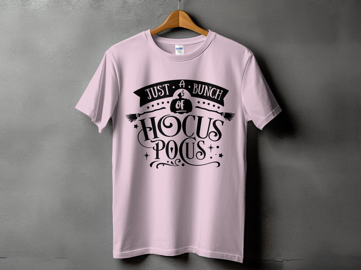 Pink t-shirt with black "Just A Bunch of Hocus Pocus" Halloween graphic.