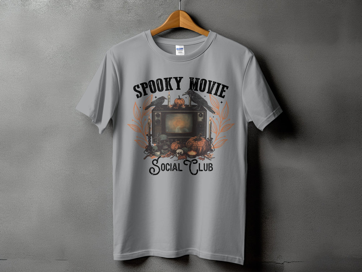 T-shirt with "Spooky Movie Social Club" text and Halloween-themed illustration.