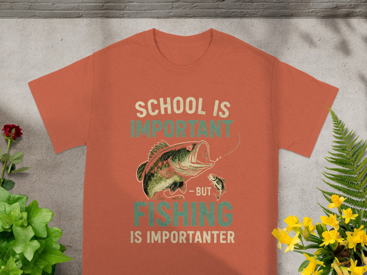 Orange t-shirt with text "School is Important - But Fishing is Importanter" and a fish graphic.