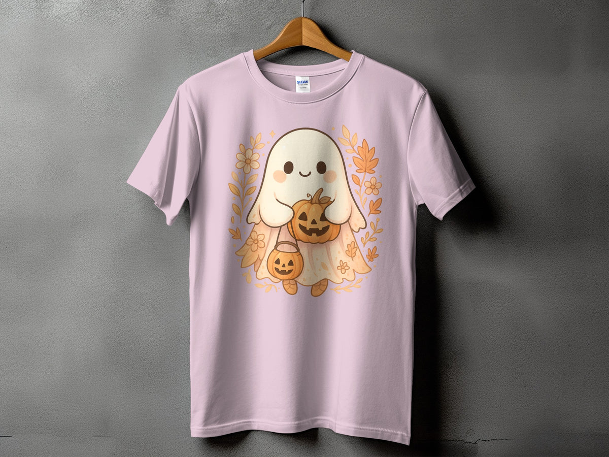 Pink t-shirt with a cute ghost holding pumpkins, surrounded by floral and leaf elements.
