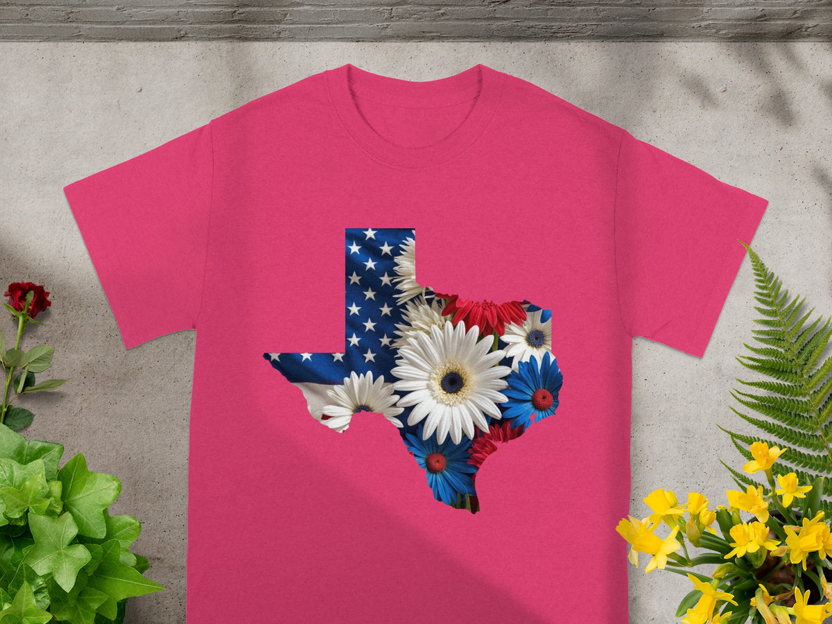 Pink t-shirt featuring a Texas outline filled with American flag and flowers.