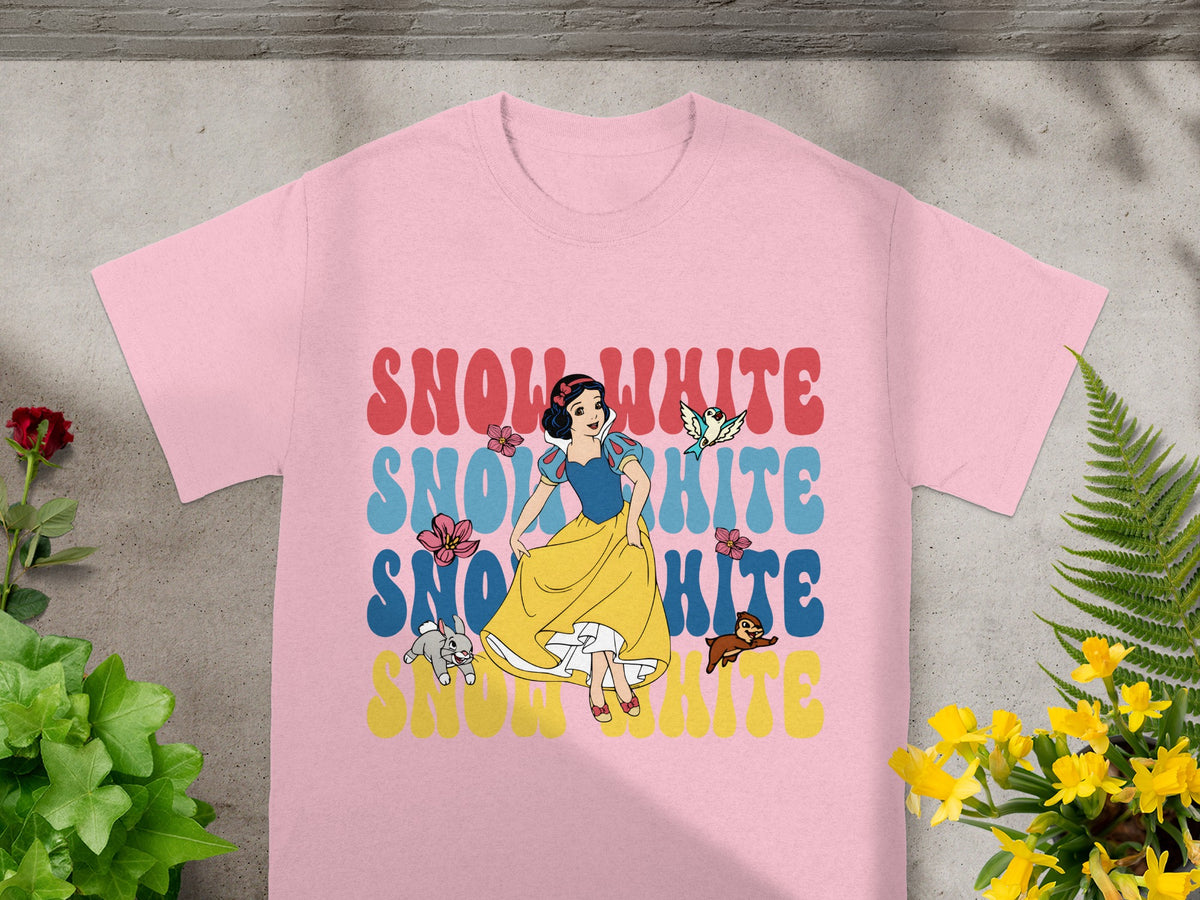 Snow White graphic on a pink t-shirt with colorful text.