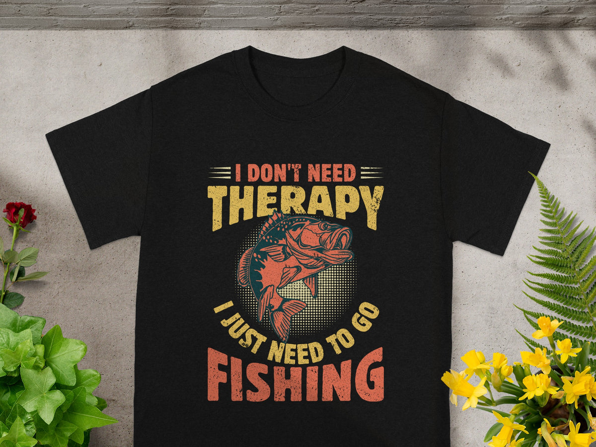 Black t-shirt with fishing graphic and text: I Don't Need Therapy, I Just Need To Go Fishing.