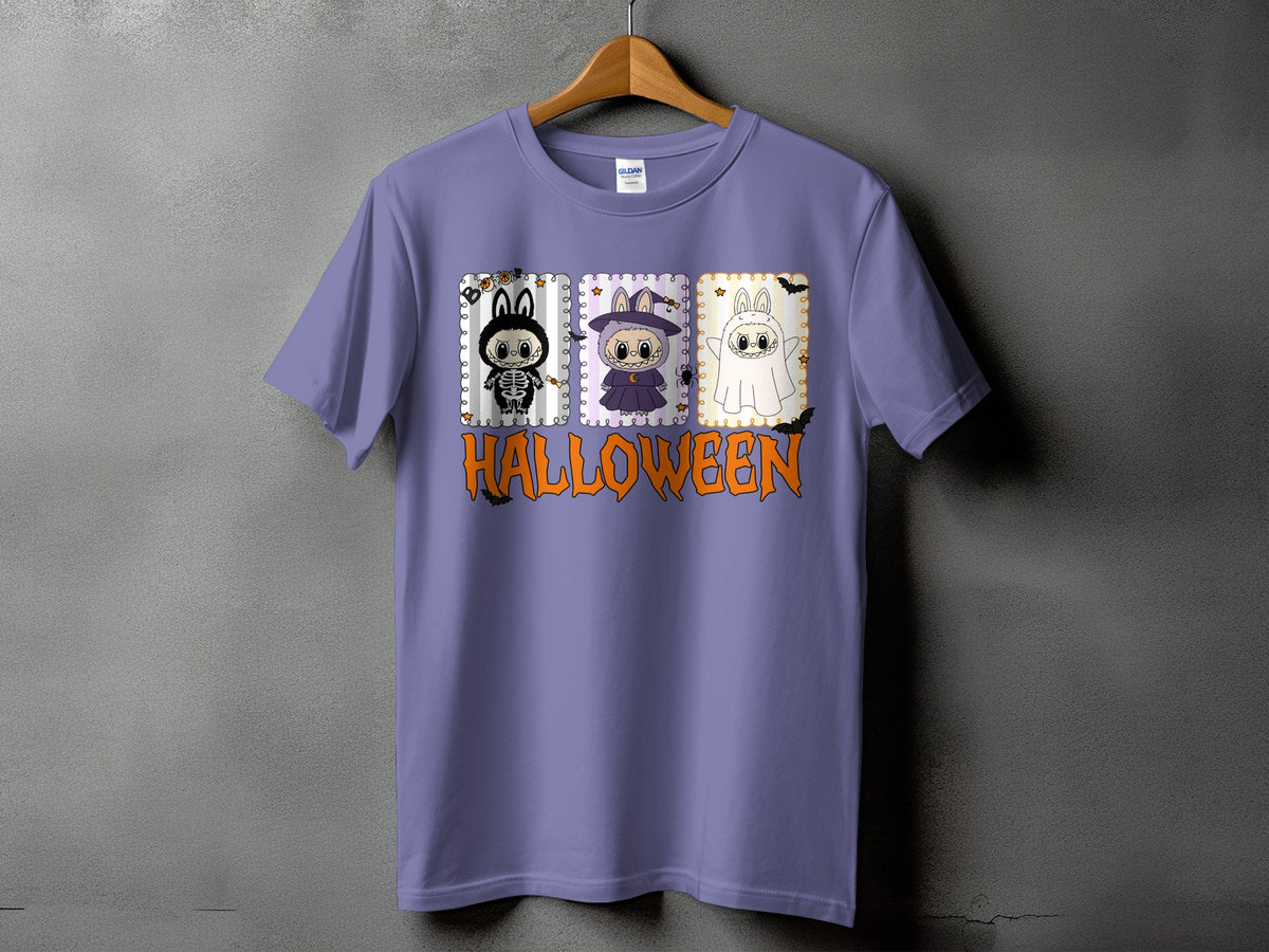 Purple t-shirt with Halloween graphic featuring three cartoon characters and text.