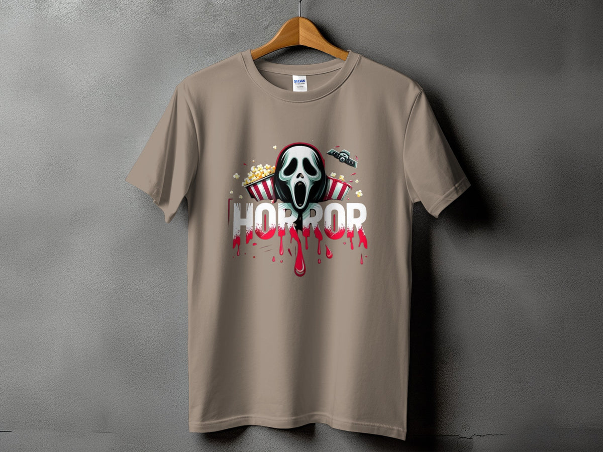 T-shirt with horror mask, popcorn, and dripping red text.