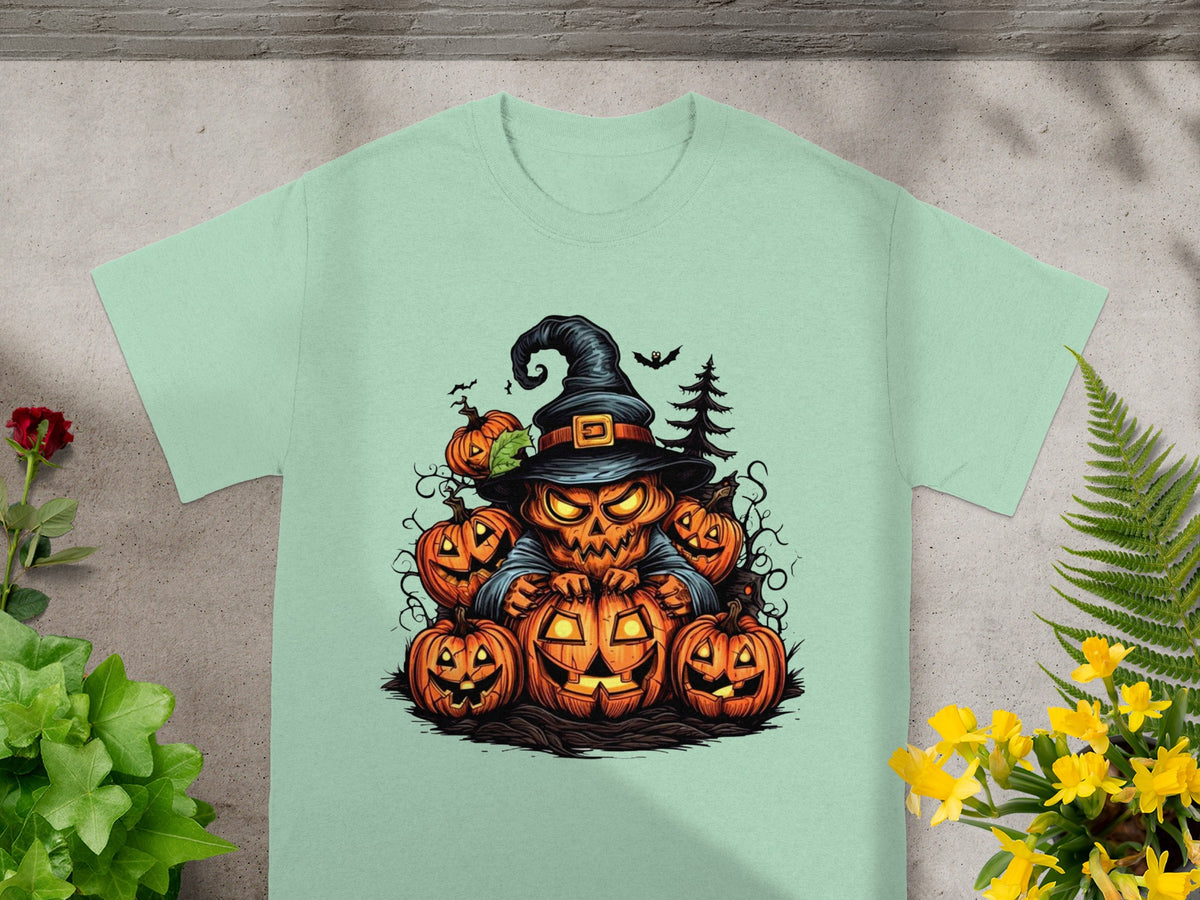 Halloween t-shirt with a jack-o'-lantern monster in a witch hat surrounded by pumpkins.